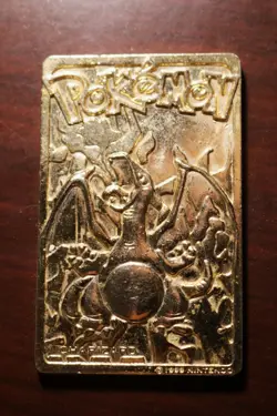 1999 Pokemon Gold Plated Charizard Trading Card Burger King - Image 1