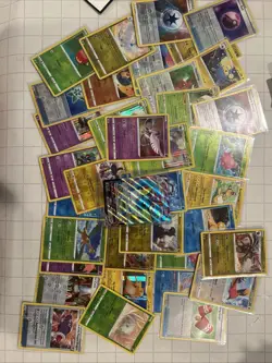 Lot of 35 Holo and Reverse Holo Pokemon Cards Including VAPOREON VMAX - Image 1