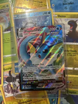 Lot of 35 Holo and Reverse Holo Pokemon Cards Including VAPOREON VMAX - Image 2