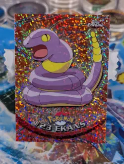 Ekans #23 Chrome Sparkle Topps Pokemon Series 1 LP Condition Factory Marks - Image 1