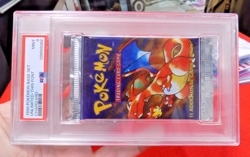 1999 POKEMON BASE SET UNLIMITED UNOPENED FOIL PACK THIN FONT CHARIZARD PSA 9 - Image 4