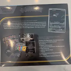 Pokemon Pitch Black ETB, Booster Bundle, and 3 Pack Blister in hand - Image 5