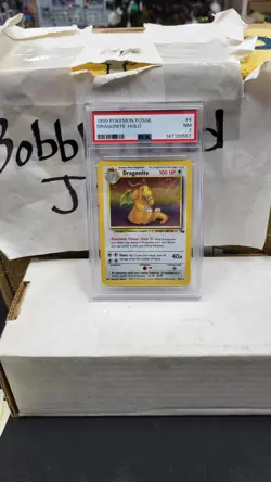 1999 DRAGONITE HOLO RARE FOSSIL POKEMON TCG PSA 7 NM NEAR MINT #4/62 - Image 1
