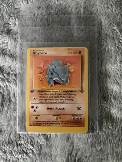 Rhyhorn Jungle 1st Edition MISCUT OC NM Pokemon Card Error Rare First Black Dot - Image 1