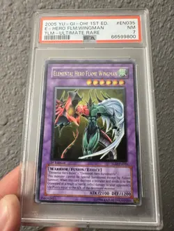 2005 YuGiOh! Elemental Hero Flame Wingman 1st Ed TLM Ultimate Rare | PSA 7 |🔥💎 - Image 1