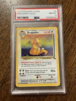 1999 POKEMON FOSSIL #4 DRAGONITE-HOLO PSA 8 - Image 1