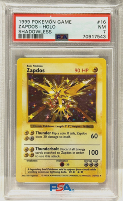 1999 POKEMON GAME #16 ZAPDOS SHADOWLESS HOLO PSA 7 MN CARD - Image 1