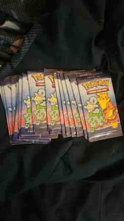 106 Packs of Pokemon Cards and Case of 2023 Annaversry Trading Cards New Sealed - Image 1