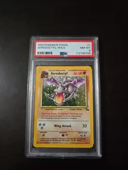 1999 Pokemon TCG Aerodactyl Holo Base Set Fossil Card 1/62 PSA 8 NM-MT - Image 1
