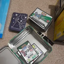 Pokemon Trading card tin case/ lunch box win/ storage tin with some cards - Image 2