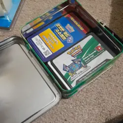 Pokemon Trading card tin case/ lunch box win/ storage tin with some cards - Image 3