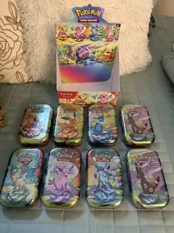 Pokemon TCG Prismatic Evolutions Mini Tin Sealed - Lot of 8 - Image 1
