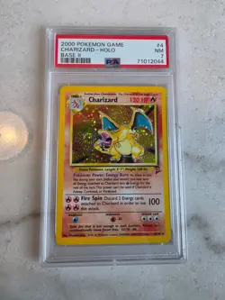 Pokemon 2000 Charizard #4/130 Base Set 2 Holo PSA 7 Near Mint Awesome Swirl - Image 1