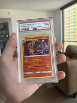Pokemon PSA 9 Charizard #SM226 Holo SM Black Star Promo 2019 - Image 1