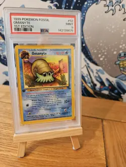 PSA 1999 Pokemon Card Fossil Omanyte 1st Edition #52 Mint 9 - Image 1