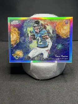 2025 Topps Cosmic Chrome - Stars in the Night Travis Hunter #STN-9 (RC) - Image 1
