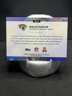 2025 Topps Cosmic Chrome - Stars in the Night Travis Hunter #STN-9 (RC) - Image 2