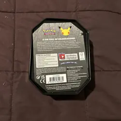 Pokemon 25th Anniversary Celebrations Tin Lance’s Charizard V (Read) - Image 2