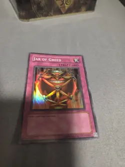 Yugioh Jar of Greed LON-047 Super Rare 1st Edition NM - Image 1