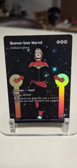 Heaven-Sent Marvel - Archangel of Thune (Borderless) - Foil NM - Image 1
