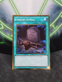 Yugioh Foolish Burial PGL2-EN051 Gold Rare 1st Edition NM - Image 1