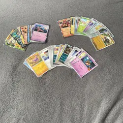 Pokemon TCG Paradox Rift 50 Card Bundle 10 Reverse Holo And 12 Holo Cards - Image 1