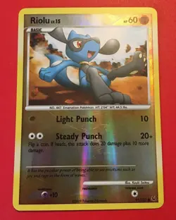 RIOLU 91/127 Pokemon Card Reverse Holo Common Excellent - Image 1