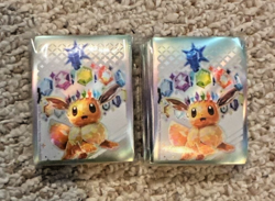 Pokemon SV Prismatic Evolutions Eevee Card Sleeves (2 packs x 65 Count) - Image 1