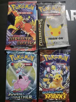 4 Pokemon Booster Packs Brand New Sealed - Image 1