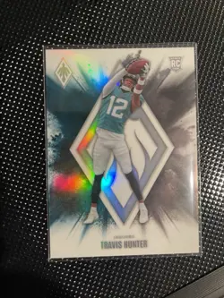 2025 Panini Phoenix - Color Blast Travis Hunter #7 (RC) - Image 1