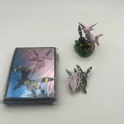 Pokemon TCG - Prismatic Evolutions Figure Collection Sleeves, Pin and Figurine - Image 1