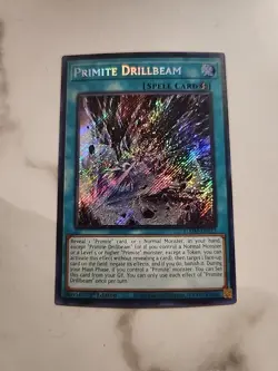 Yugioh | Primite Drillbeam (SE) BLMM-EN173 Secret Rare 1st Edition Near Mint NM - Image 1