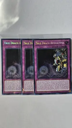 3x True Draco Apocalypse 1st Edition Secret Rare BLMM-EN177 Yu-Gi-Oh! Playset - Image 1