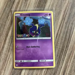 Cosmog - 64/149 - Cosmos Holo - Promo - Stamped - Toys R Us - Pokemon Card - MP - Image 1