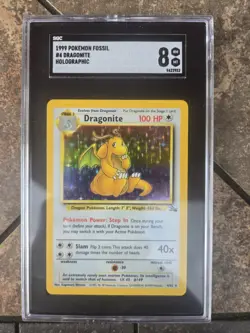 1999 Pokemon Dragonite Fossil Holo #4 SGC 8 Near Mint Graded Card - Image 1