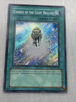 Yugioh Charge of the Light Brigade TDGS-EN089 Secret Rare 1st Edition NM - Image 1