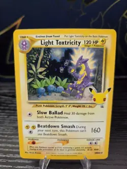 Pokemon Celebrations Light Toxtricity SWSH137 Sword & Shield Promo Card Holo LP - Image 1