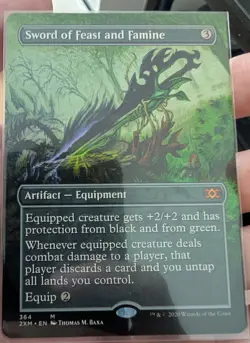 MTG Sword of Feast and Famine (Borderless) Double Masters Regular NM - Image 1