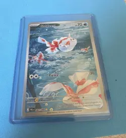 Goldeen 087/084 Illustration Rare Holo Pitch Black Pokemon Card in Hand - Image 1