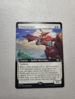 1x Claim Jumper Extended Art Outlaws of Thunder Junction Regular NM - Image 1