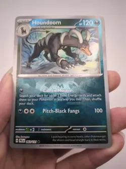 Houndoom 063/131 Master Ball Pokemon Prismatic Evolutions NM - Image 1