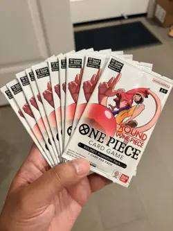 Round 1 x One Piece Card Game Promo (ENGLISH) 10 SEALED PACKS in hand - Image 1