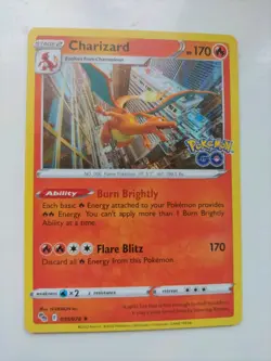 Pokemon TCG Charizard Pokemon Go 010/078 Holo Card - Image 1