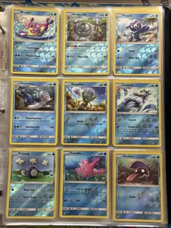 Near Complete Sun & Moon Holo & Reverse Holo Pokemon Card Lot With Mew Binder - Image 3