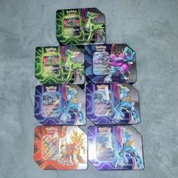 Pokemon TCG Paradox Clash (3) Tins + (4) Paradox Destinies Tins - Image 1