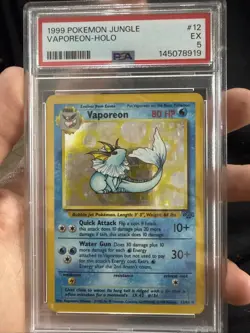 PSA 5 1999 POKEMON JUNGLE VAPOREON-HOLO #12 - Image 1