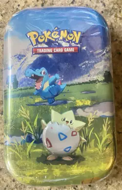 Pokemon TCG: Mega Evolution—Ascended Heroes Mini Tin, Togepi And Totodile - Image 1