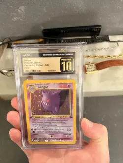 1st Edition 1999 Gengar Holo CGC Pristine 10 Pokemon Card Fossil Set 5/62 - Image 1