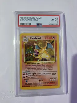 1999 Pokemon Charizard Base Set Unlimited Holo Rare #4 PSA 8 - Image 1