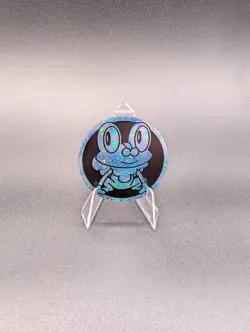 Pokemon Chaos Rising ETB Exclusive Coin Froakie - Image 1